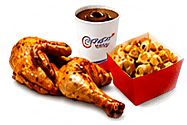 Peri peri grilled chicken meal with rice and a drink from Zamanos Pizza